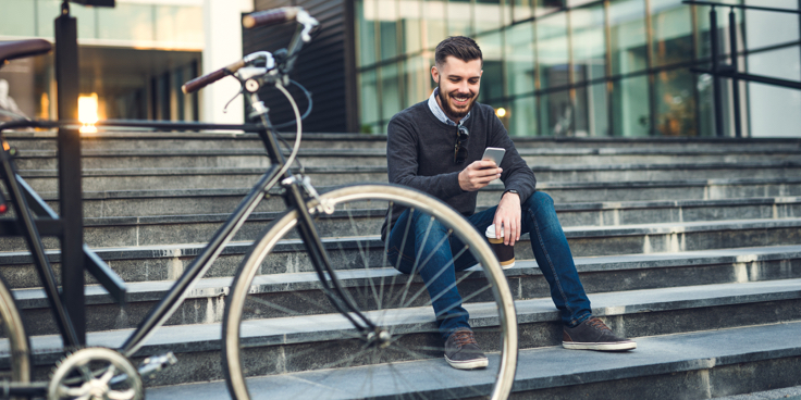 woman checking energy use on tablet